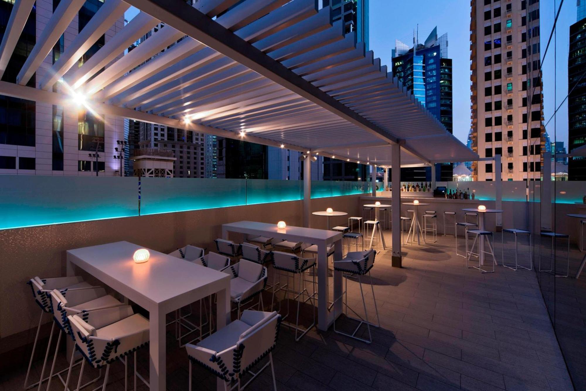 Hotel W Ad Dawhah Esterno foto The rooftop bar at the W Dubai - Jumeirah Lakes Towers
